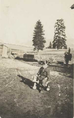 Jack Helms in the homestead front yard circa 1920